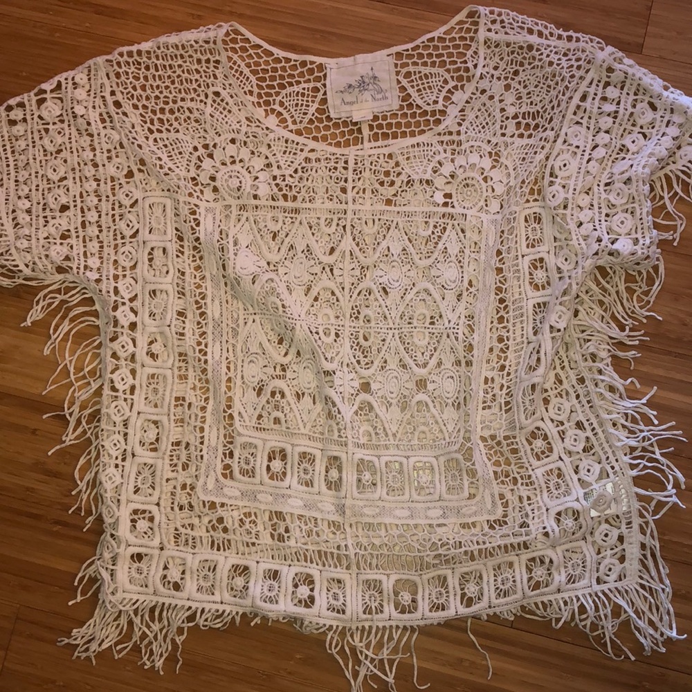 Anthropologie fringe overlay top!